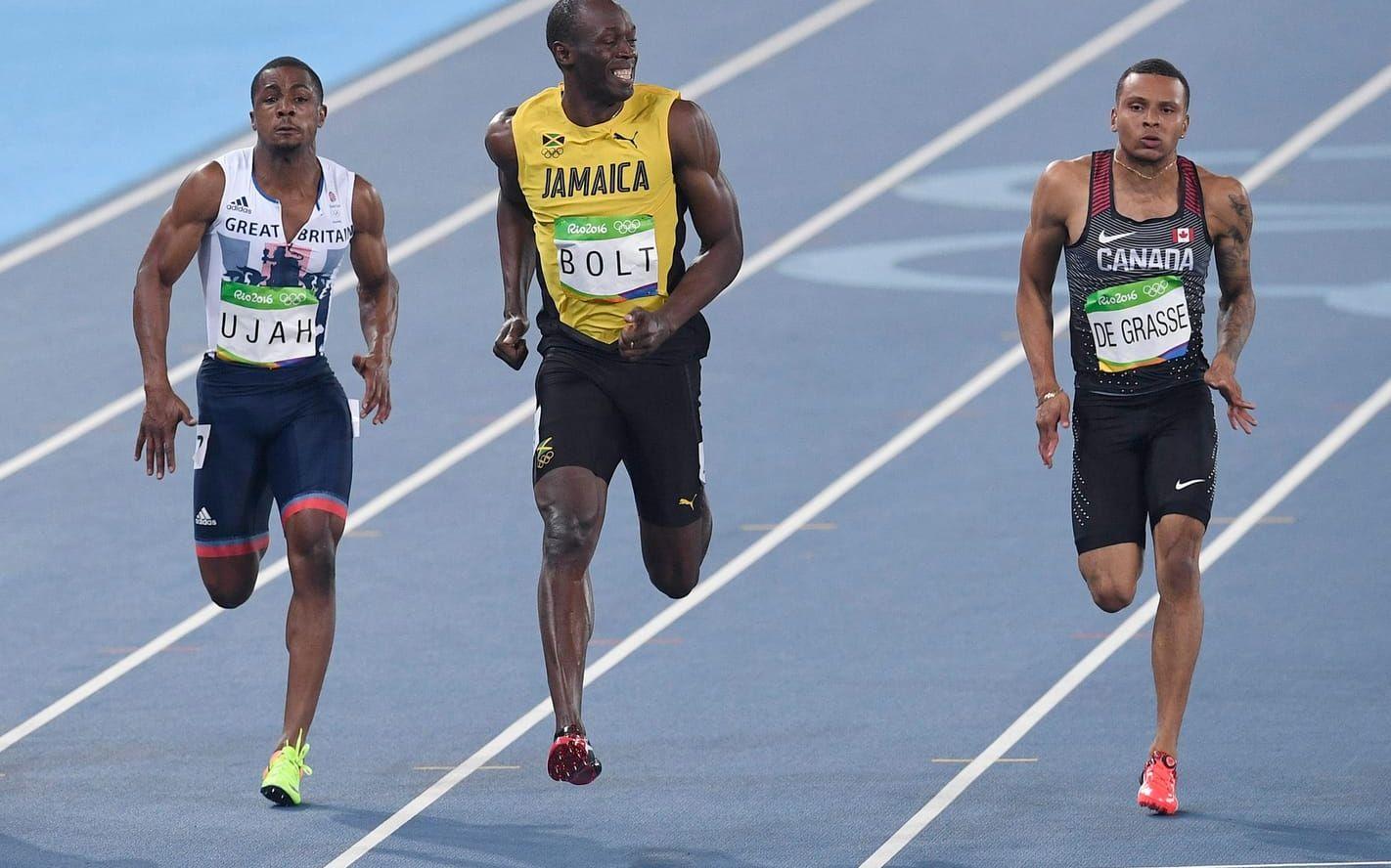 Leende. Usain Bolt visar sin överlägsenhet på sträckan 100 meter när han tar hem sin semifinal och tar sig tid att under målgången vända sig mot kameran och fyra av ett brett leende. Leendet gör braksuccé och blir snart ett meme på Twitter. Bolt tar senare guld på 100 meter i Rio. Foto: TT
