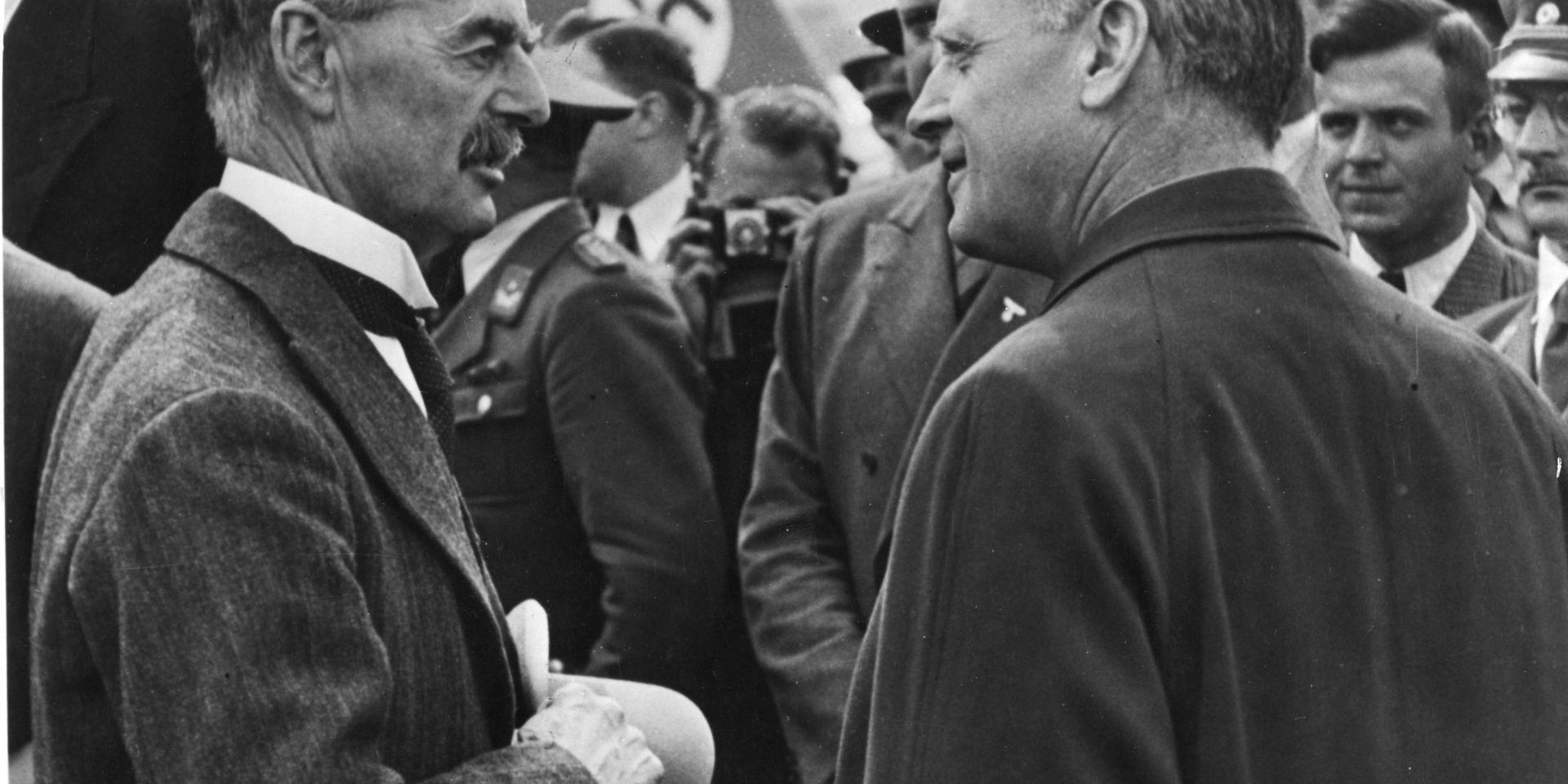 British Premier Sir Neville Chamberlain chats with German foreign minister Joachim von Ribbentrop, shortly after Chamberlain&apos;s arrival in Munich, Germany, September 15, 1938. (AP Photo)
