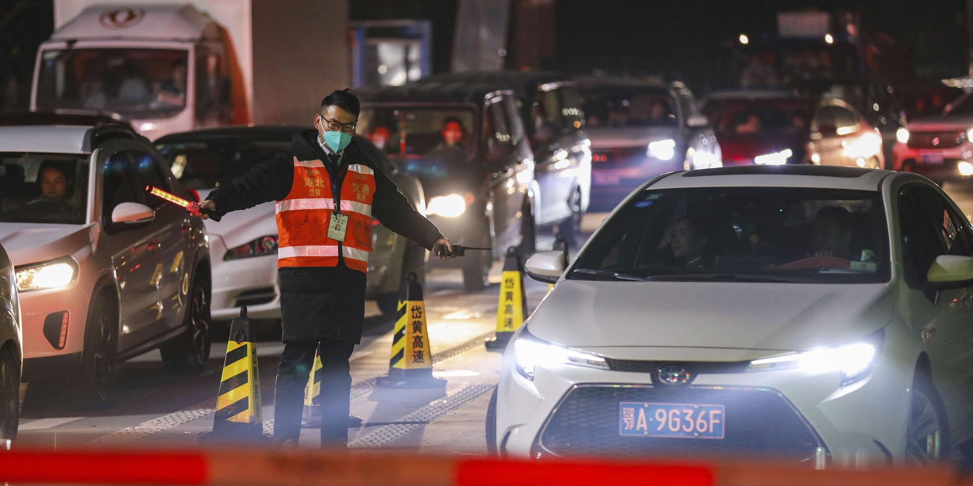 En vägtull i Wuhan, där utbrottet först upptäcktes. 