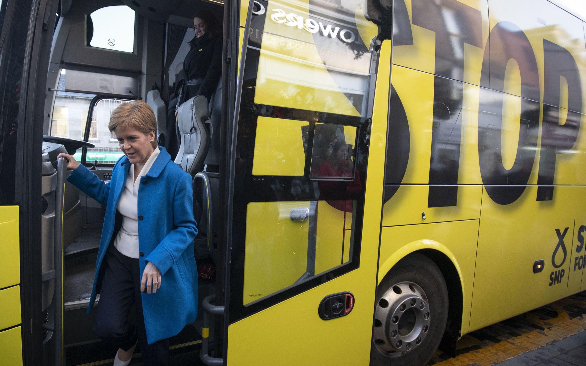 Scottish National Party (SNP) leader Nicola Sturgeon arrives for an election stopover on the General Election campaign trail in Lanark, Scotland, Monday Dec. 9, 2019.  The UK goes to the polls in a General Election on Dec. 12. (Jane Barlow/PA via AP)  LRC804