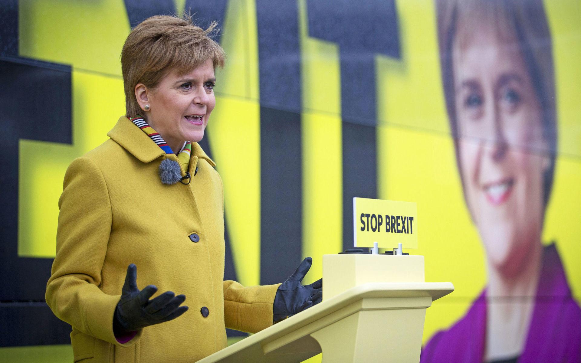 Scottish National Party (SNP) leader Nicola Sturgeon launches the party&apos;s election campaign bus, featuring a portrait of herself, at Port Edgar Marina in the town of South Queensferry, Scotland, before setting off on a tour of Scotland for the final week of the SNP&apos;s General Election campaign, Thursday Dec. 5, 2019.  Britain&apos;s Brexit is one of the main issues for all political parties and for voters, as the UK goes to the polls in a General Election on Dec. 12. (Jane Barlow/PA via AP)  LRC817