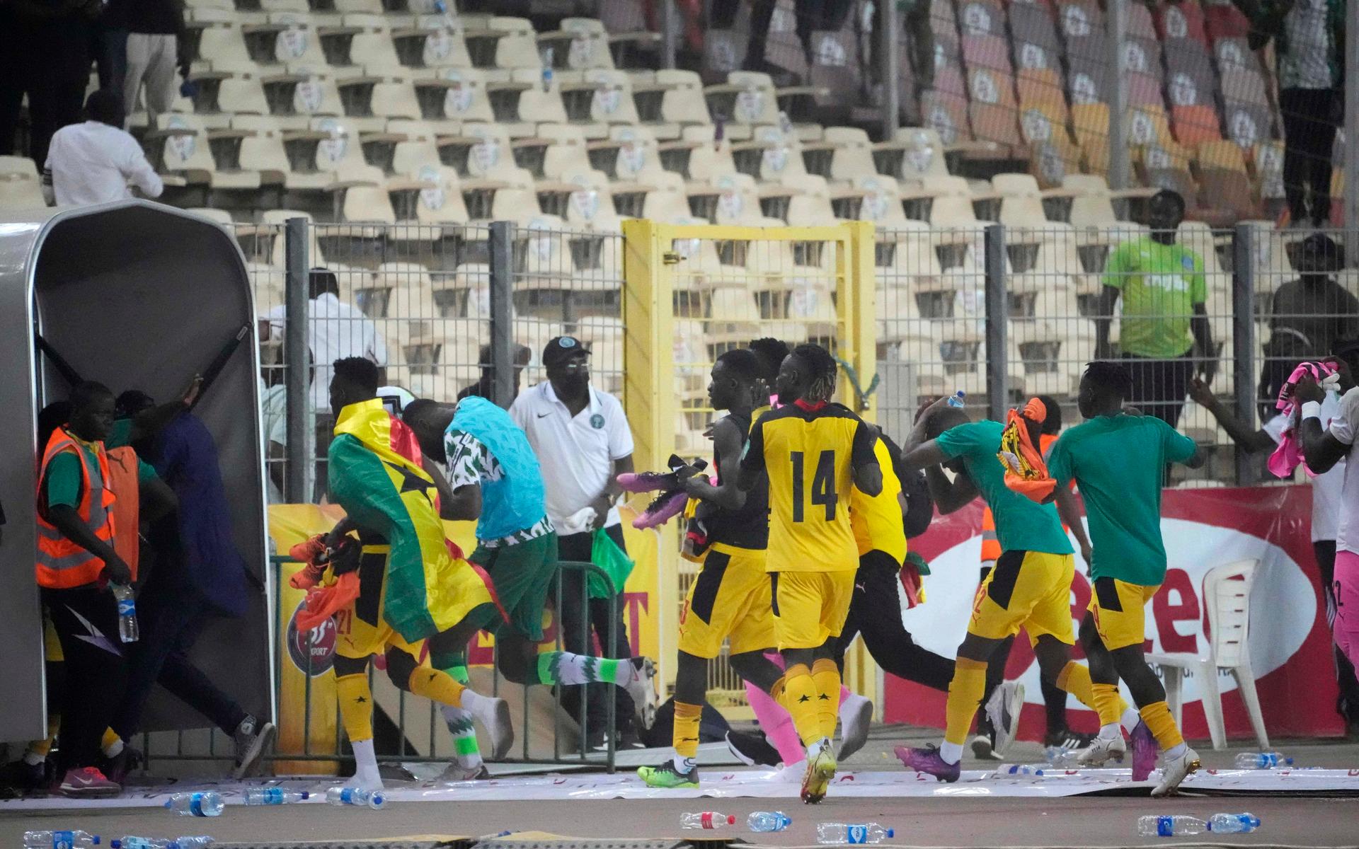 Ghana&apos;s spelare tvingades fly efter att de säkrat en plats i Qatar-VM. 