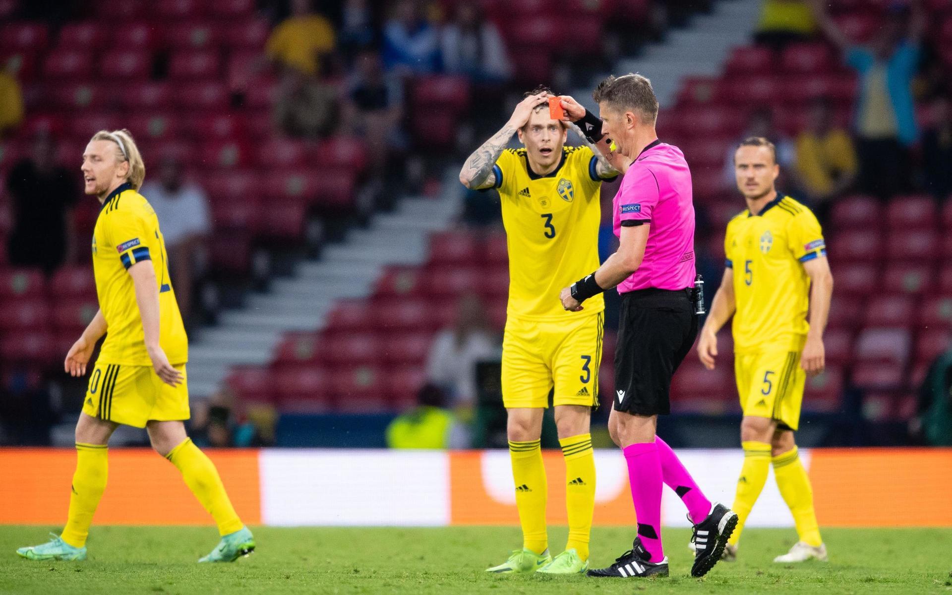 Marcus Danielson (not in picture) of Sweden gets a red card during the UEFA Euro 2020 Football Championship round of 16 match between Sweden and Ukraina on June 29, 2021 in Glasgow. 
