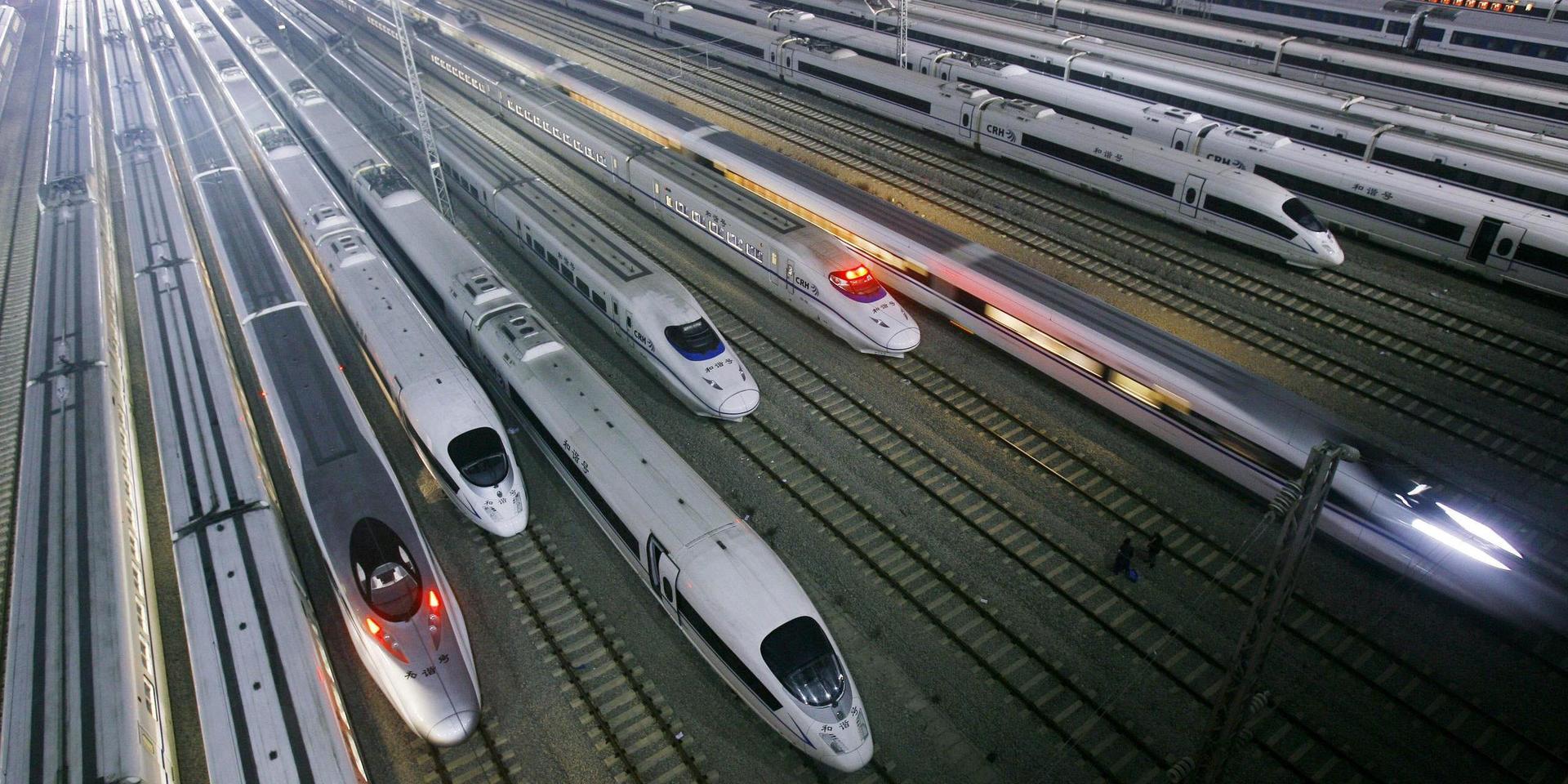 China's CRH high-speed trains sit on tracks at a maintenance base in Wuhan, in central China's Hubei province, Wednesday Jan. 11, 2012. (AP Photo)  CHINA OUT