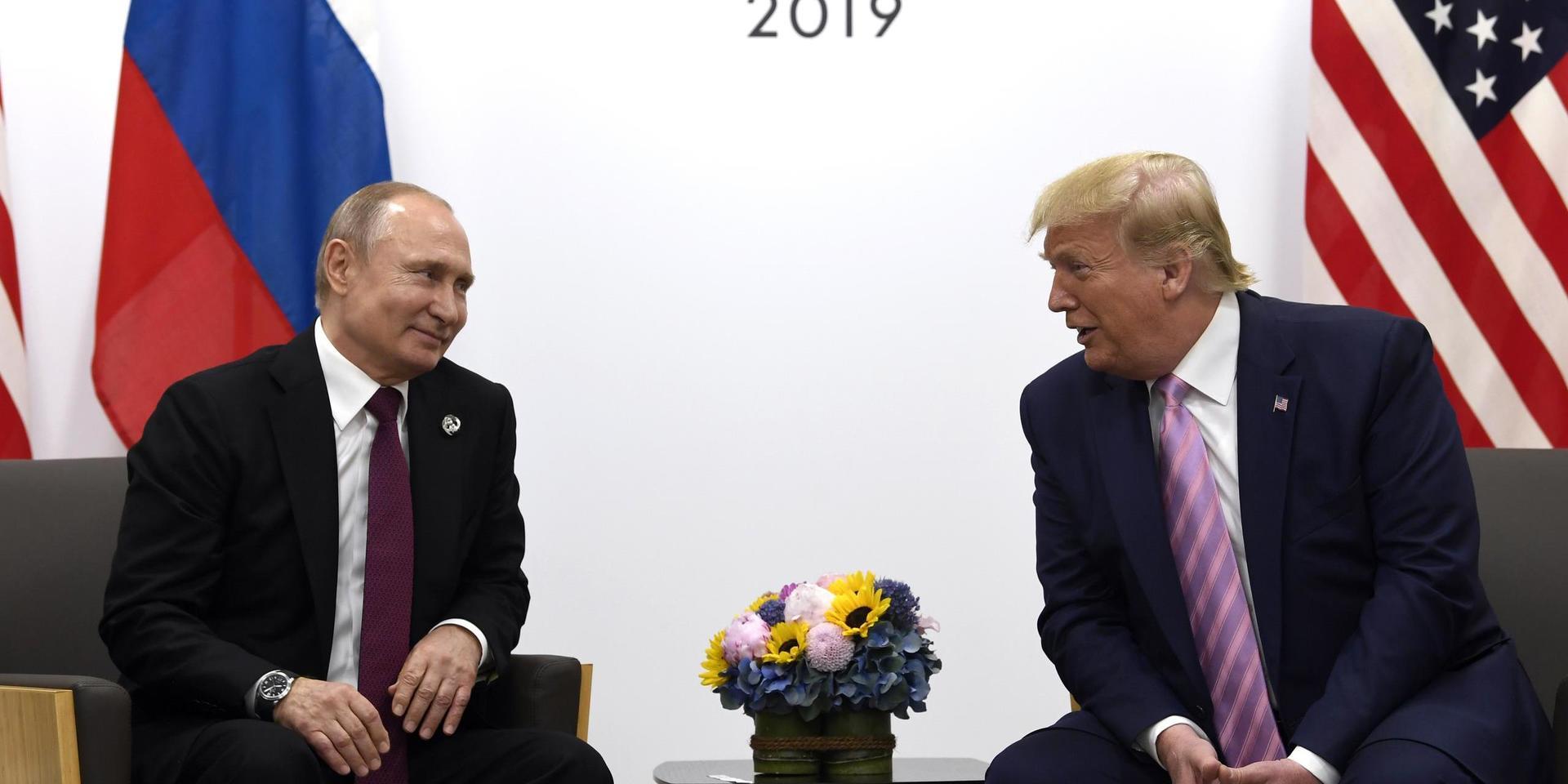 FILE - In this June 28, 2019, file photo, President Donald Trump, right, meets with Russian President Vladimir Putin during a bilateral meeting on the sidelines of the G-20 summit in Osaka, Japan. The U.S. and Russia have agreed to start arms control talks this month as the only remaining treaty between the two largest nuclear powers is poised to expire in less than a year, Marshall Billingslea, the president’s special envoy for arms control, said Monday, June 8, 2020.