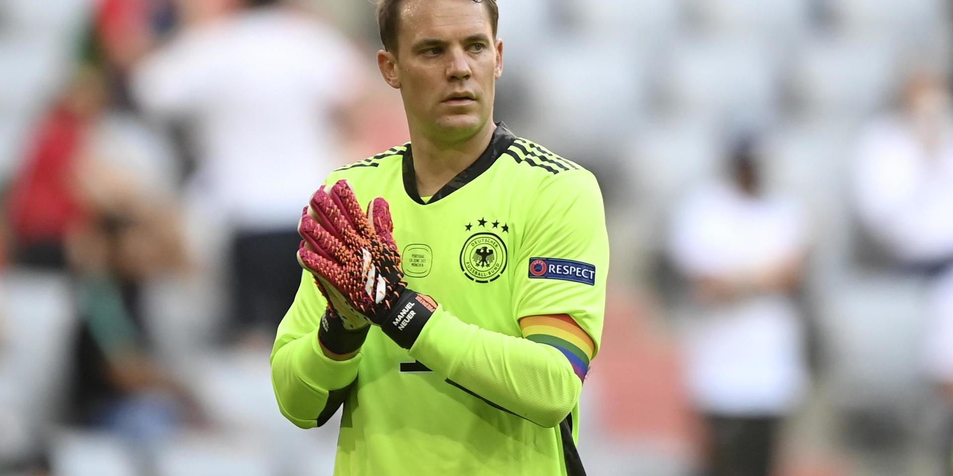 Germany's goalkeeper Manuel Neuer walks on the pitch during the Euro 2020 soccer championship group F match between Portugal and Germany at the Football Arena stadium in Munich, Germany, Saturday, June 19, 2021. (Philipp Guelland/Pool via AP)  XAF132