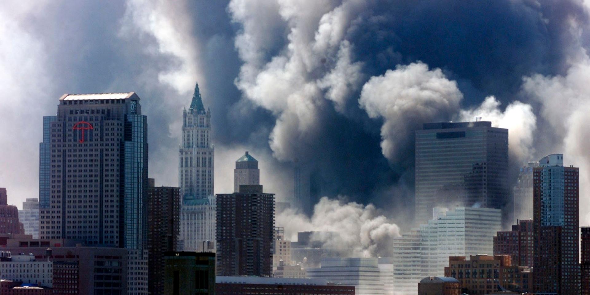 Smoke from the World Trade Center fills lower Manhattan Tuesday, Sept. 11, 2001, shortly after the second tower collapsed. Photo is taken across the Hudson River frm Hoboken, N.J. (AP Photo/Daily Record, Mike Buscher)