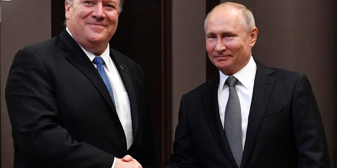USA:s utrikesminister Mike Pompeo och Rysslands president Vladimir Putin.