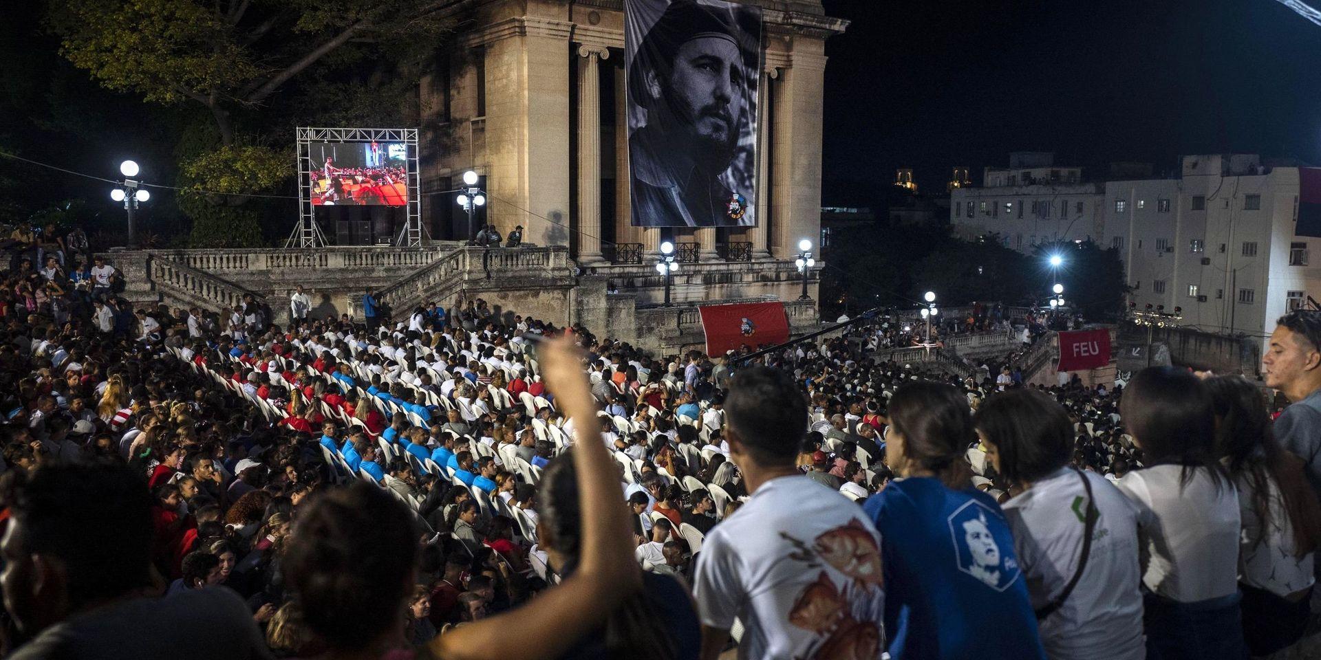 People gather at Havana University for a memorial event commemorating the third anniversary of the death of the late Cuban leader Fidel Castro in Havana, Cuba, Monday, Nov. 25, 2019. Castro died at 90.