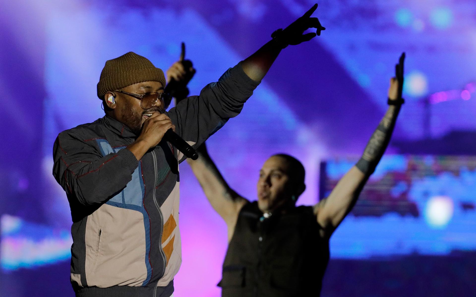 Apl.de.ap, left, and Taboo of the U.S. band Black Eyed Peas perform at the Rock in Rio music festival in Rio de Janeiro, Brazil, Saturday, Oct. 5, 2019. (AP Photo/Leo Correa)  XLC137
