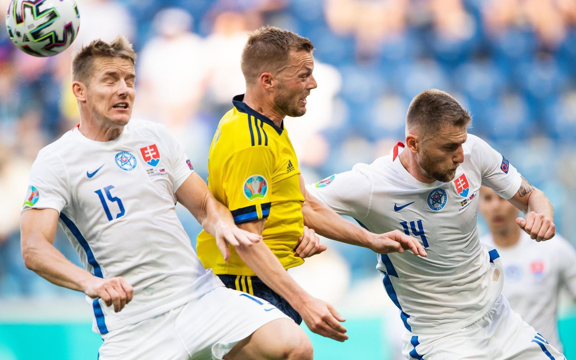 Tomas Hubocan and Milan Skriniar of Slovakia against Sebastian Larsson of Sweden during the UEFA Euro 2020 Football Championship match between Sweden and Slovakia on June 18, 2021 in Saint Petersburg. 