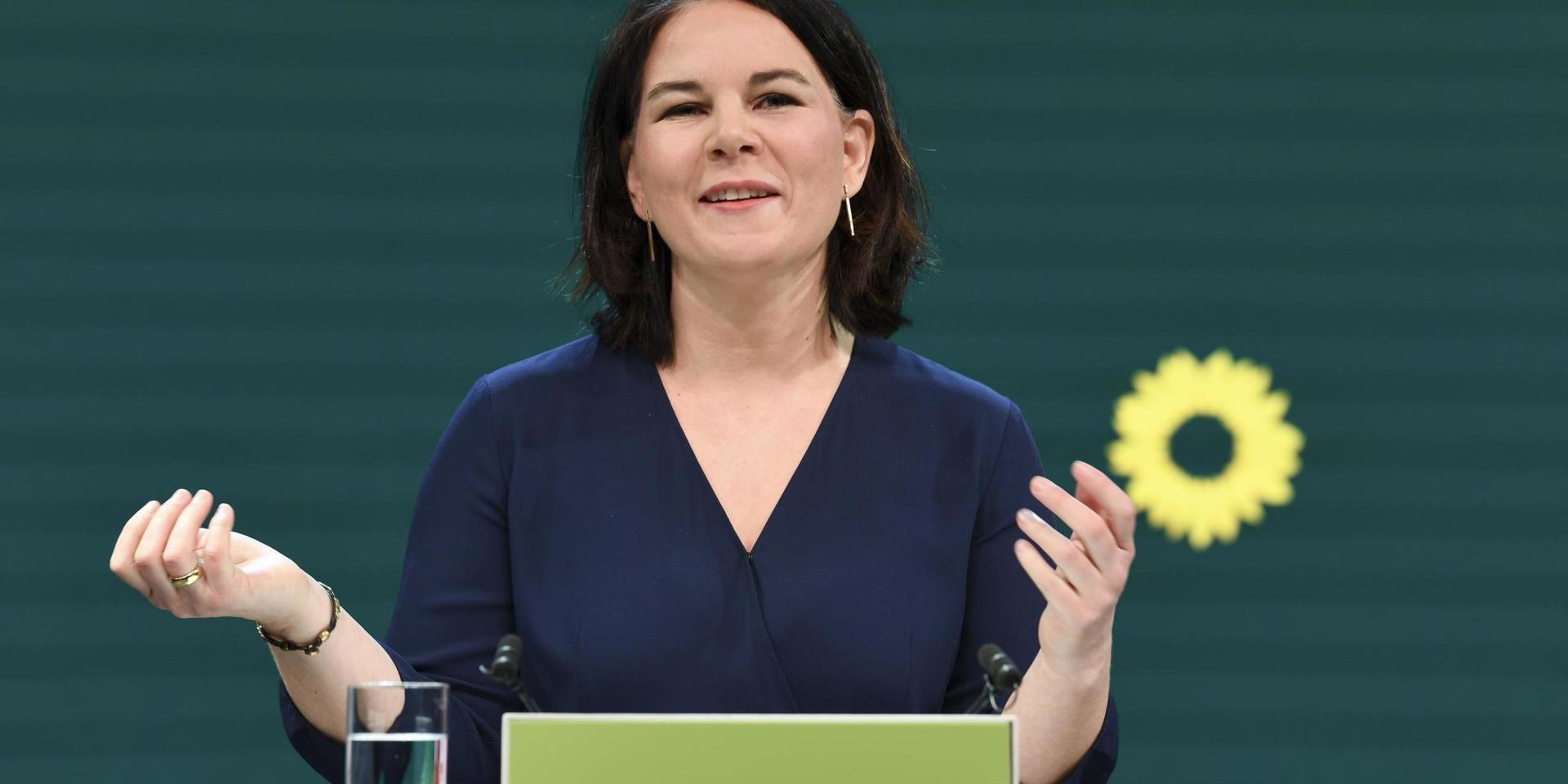 Germany's Green party co-leader Annalena Baerbock gives a speech during a digital announcement event in Berlin, Germany, where the party presented her as top candidate for chancellor for the upcoming federal election later this year, Monday, April 19, 2021. (Annegret Hilse/Pool via AP)  DMME111