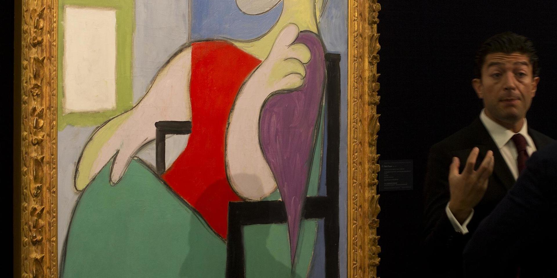 Tavlan 'Femme assise près d'une fenêtre (Marie-Thérèse)' av Pablo Picasso.
