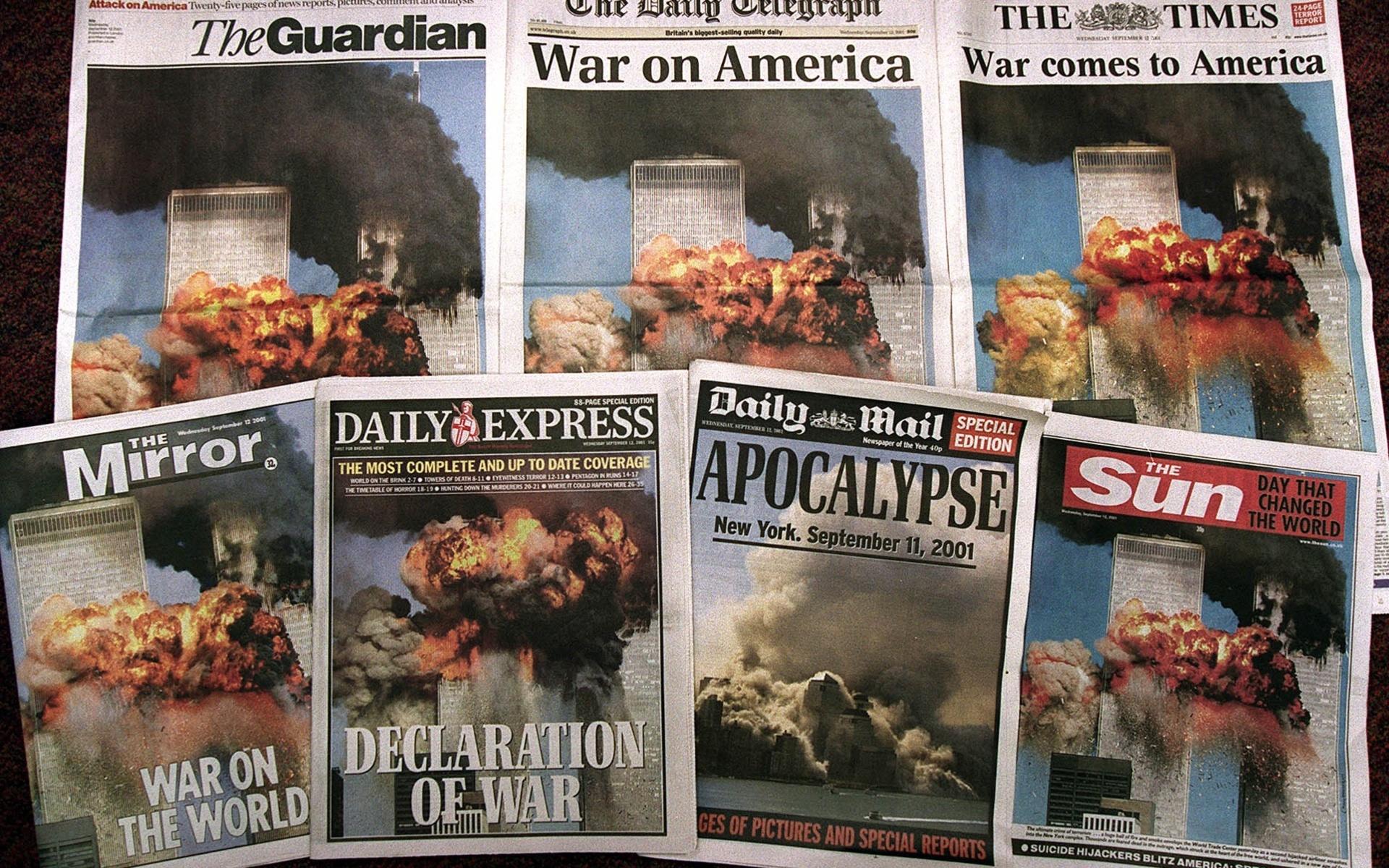 Front pages of the British national newspapers Wednesday Sept. 12, 2001 covering the terrorism attacks in New York City. (AP Photo/Martin Cleaver)