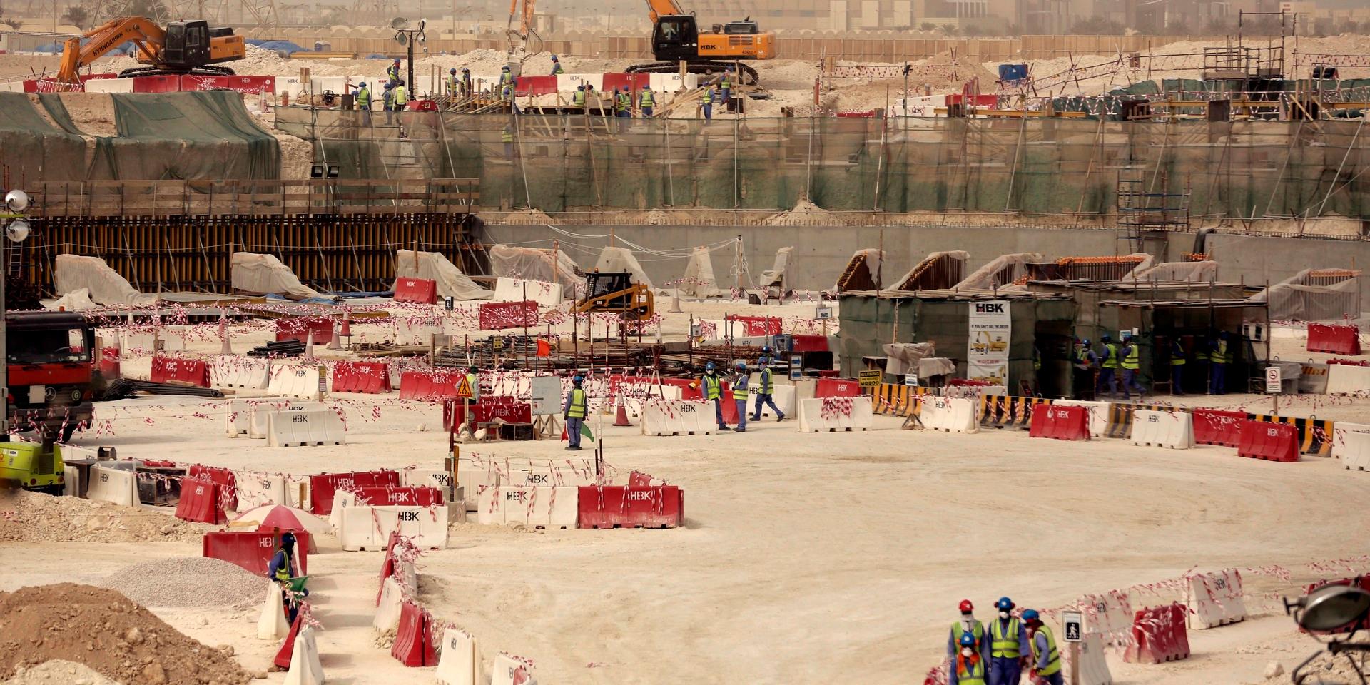  In this photo taken during a government organized media tour, laborers work at the Al-Wakra Stadium that is under construction for the 2022 World Cup, in Doha, Qatar, Monday, May 4, 2015. Qatars top labor official told The Associated Press Monday that Qatars inability to ensure decent housing for its bulging migrant labor population was a mistake the government is working to fix as it prepares to host the 2022 World Cup, vowing his country would improve conditions for its vast foreign labor force. (AP Photo/Maya Alleruzzo)